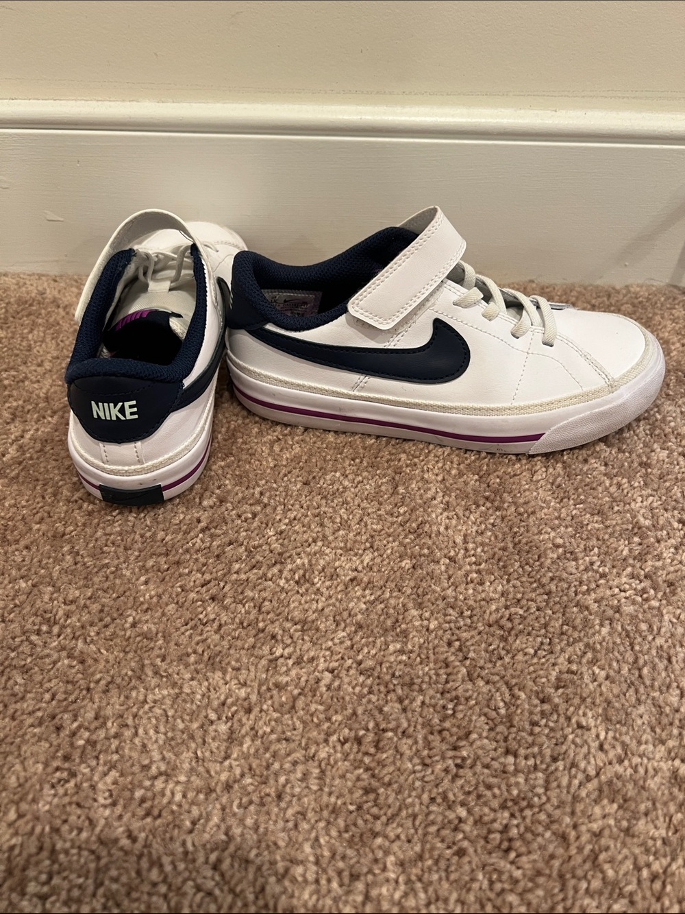 Nike White Sneakers with Navy Swoosh and Purple Accent